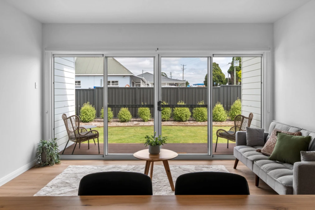 Living room with sliding doors to garden