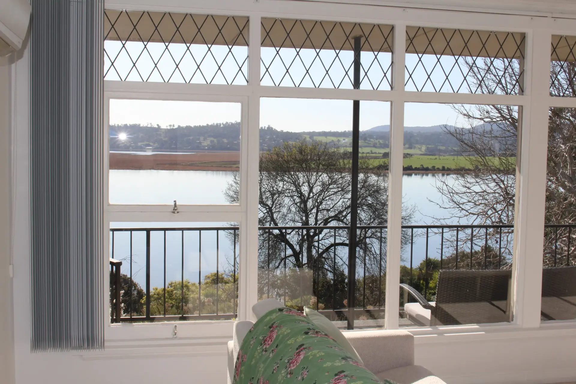 Stylish lounge with panoramic waterfront view