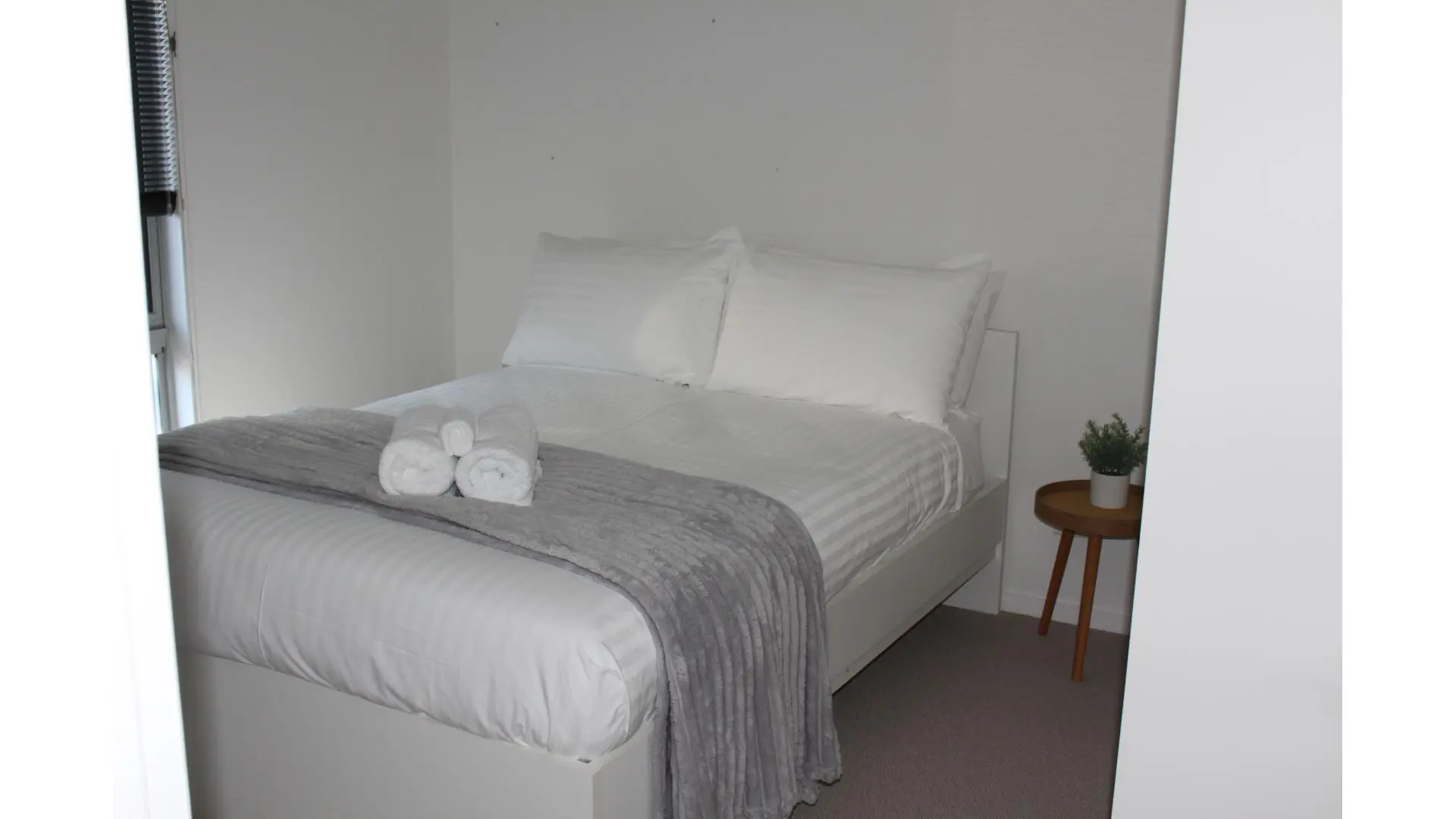 Cosy bedroom with quality bedding and towels.
