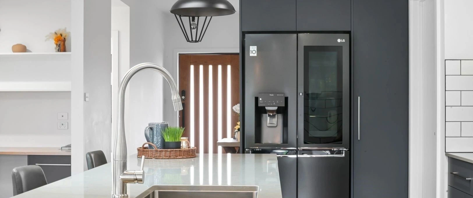 Modern kitchen with sleek appliances and decor
