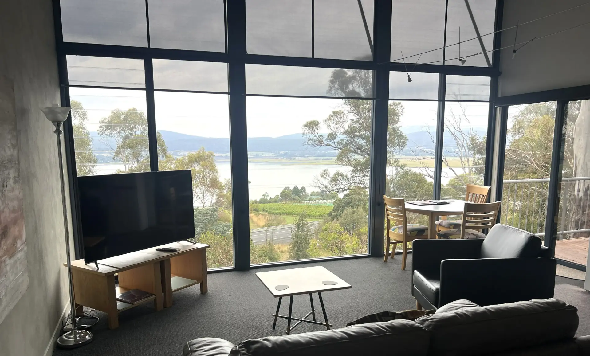 Modern living room with expansive river views