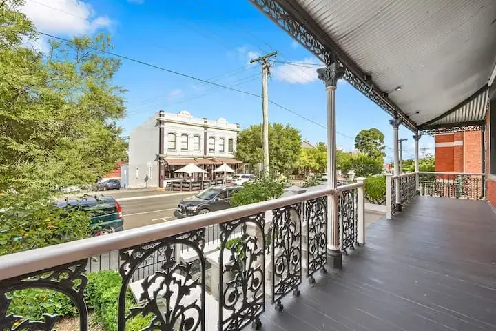 Verandah balcony overlooking leafy historic town street