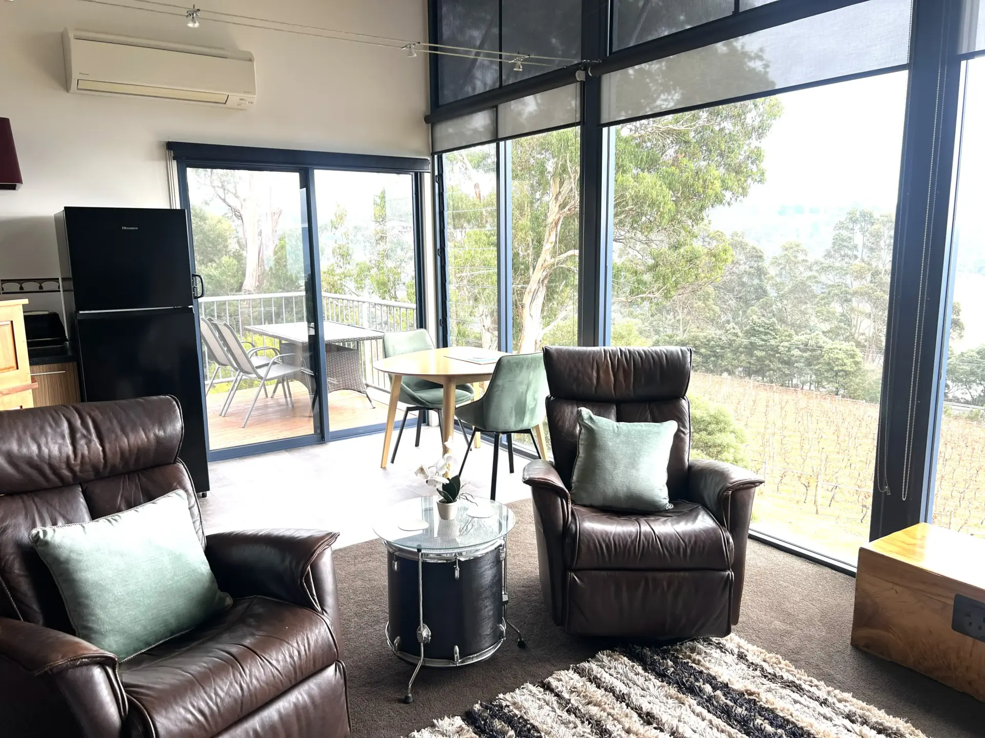 Modern living room with forest views