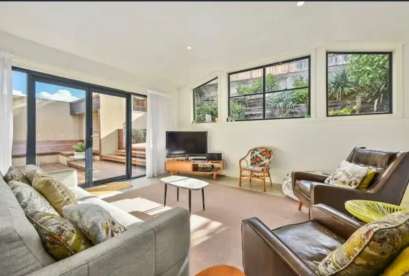 Bright modern living room with patio access