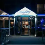 Entrance to Mudbar restaurant at night