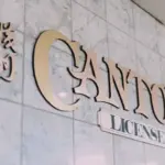 Canton Licensed sign on tiled wall